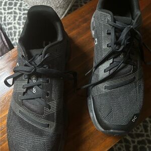 On cloud woman running shoes.